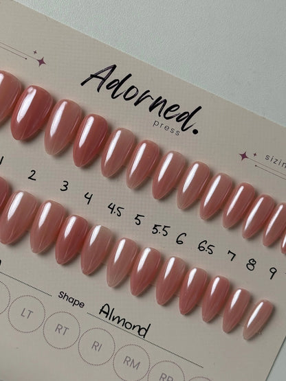 28 press ons of different sizes on backing card pink and chrome finish medium almond