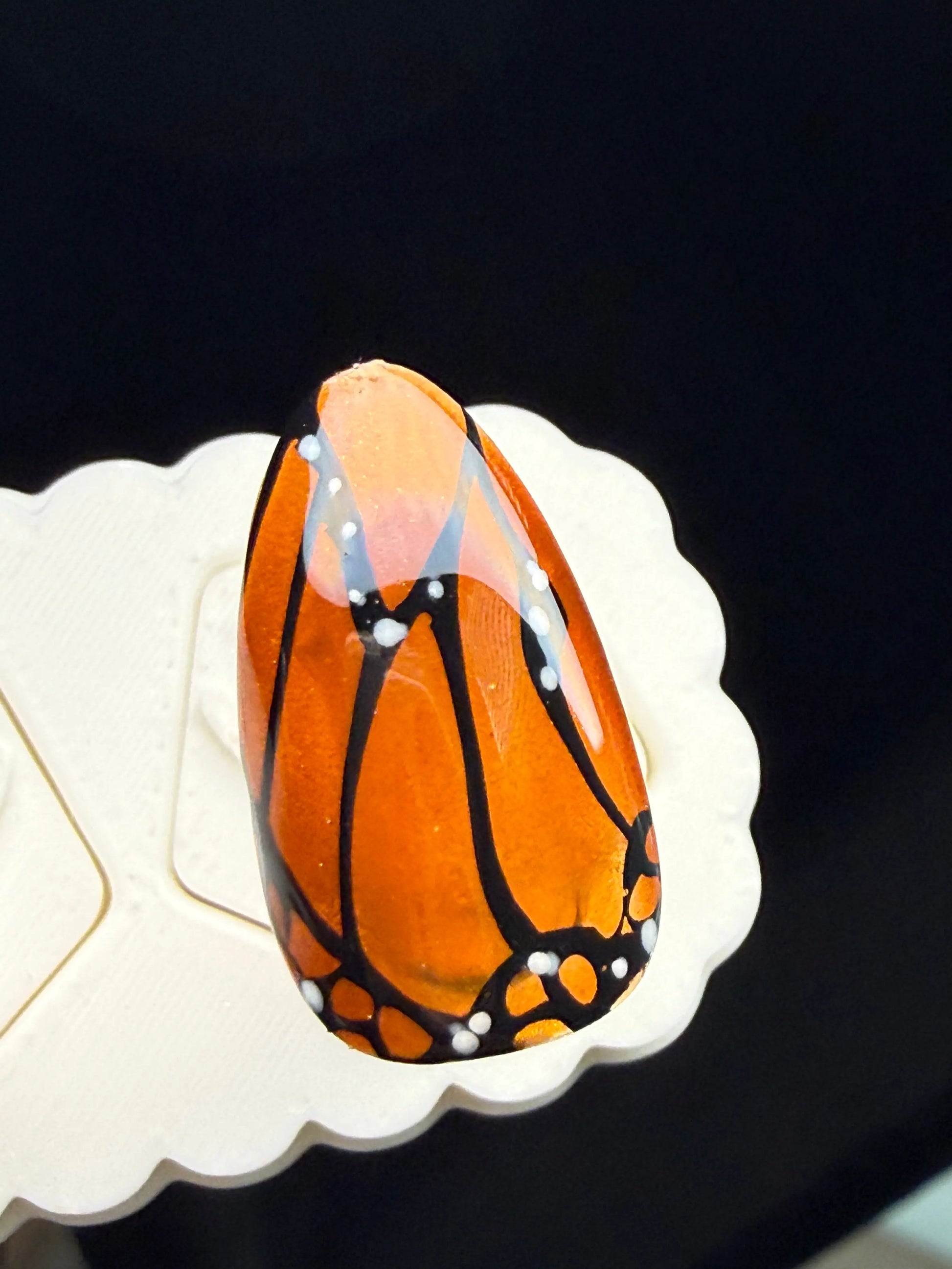 Close up of Monarch Butterfly press ons